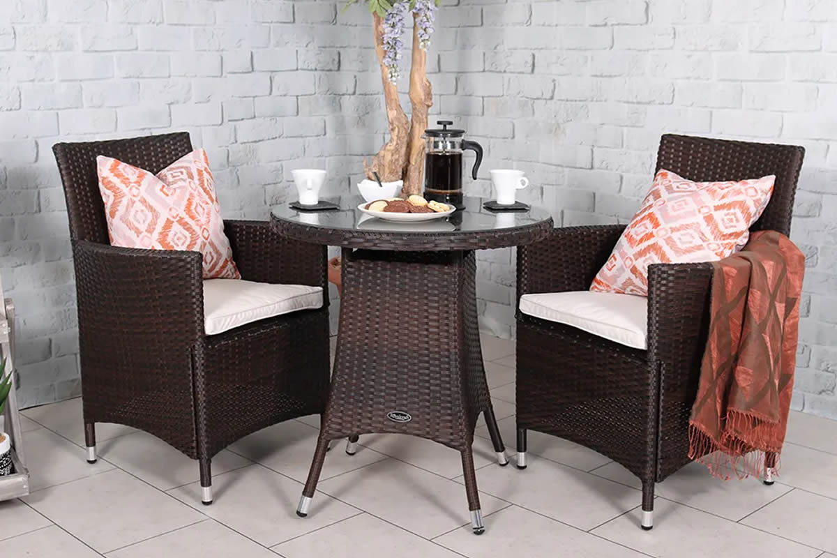 View Brown Synthetic Rattan 2 Seater Garden Bistro Set 2 Stackable Armchairs With Waterproof Cream Cushions Round Table With Black Glass Top Cannes information
